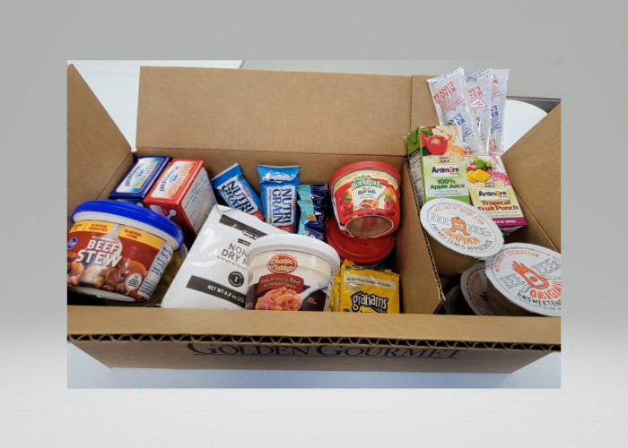 Open box of shelf stable dinner items
